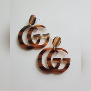 Lovely Brown Double G Statement Earrings - Acrylic. No Brand
